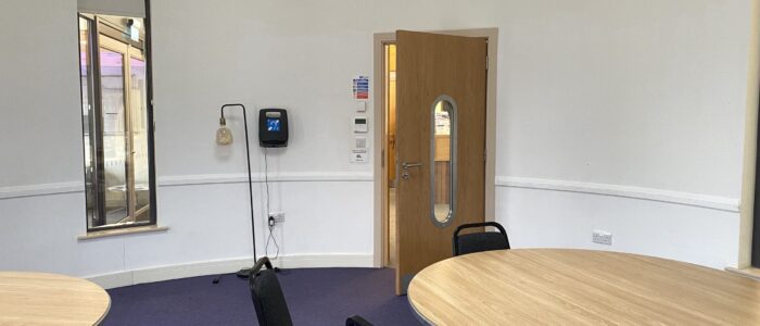 Roundel set up with round tables. Induction loop hearing box.